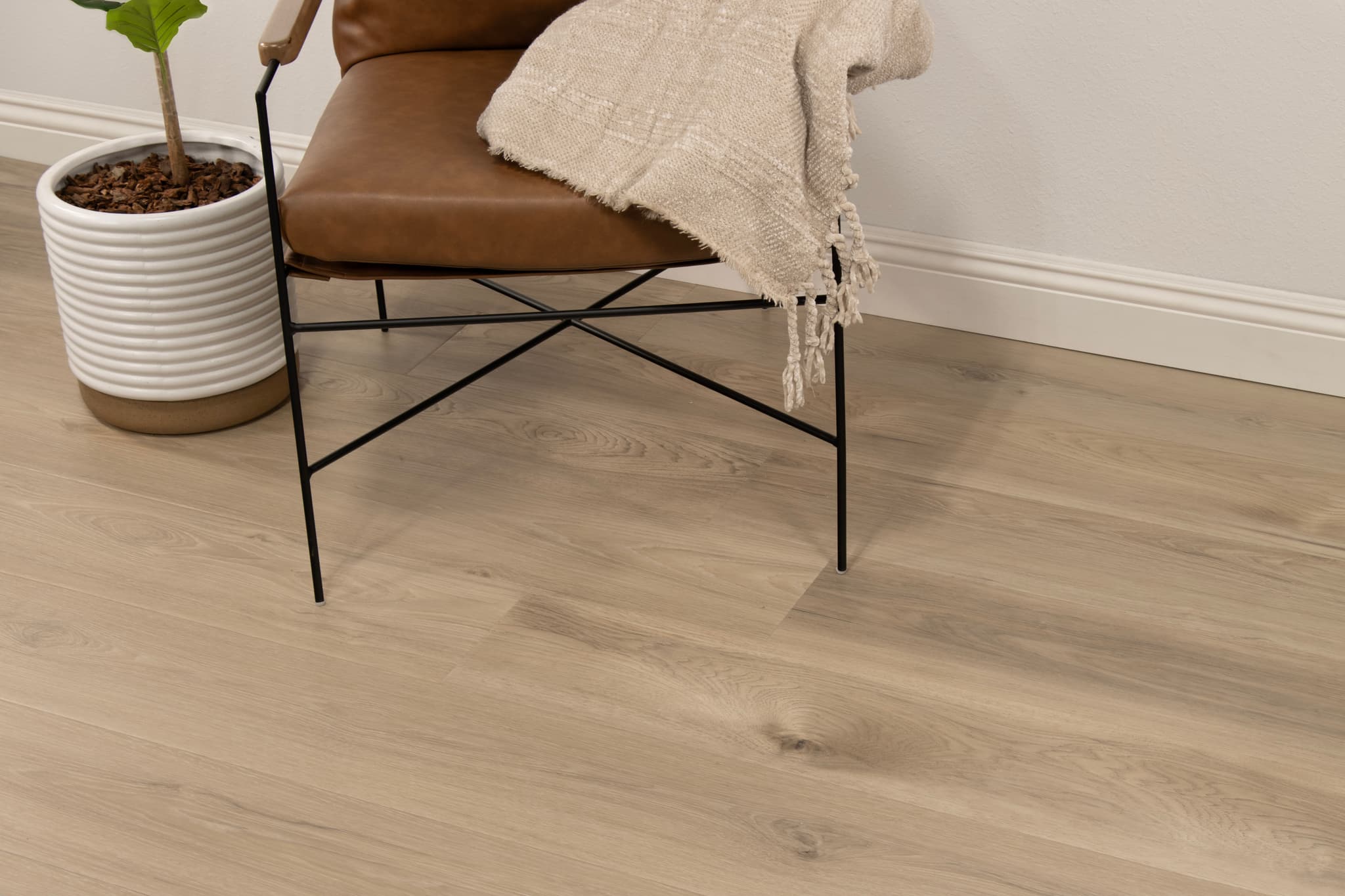 Waterproof Flooring Guide 2026: Vinyl, Laminate, Hardwood & Bamboo