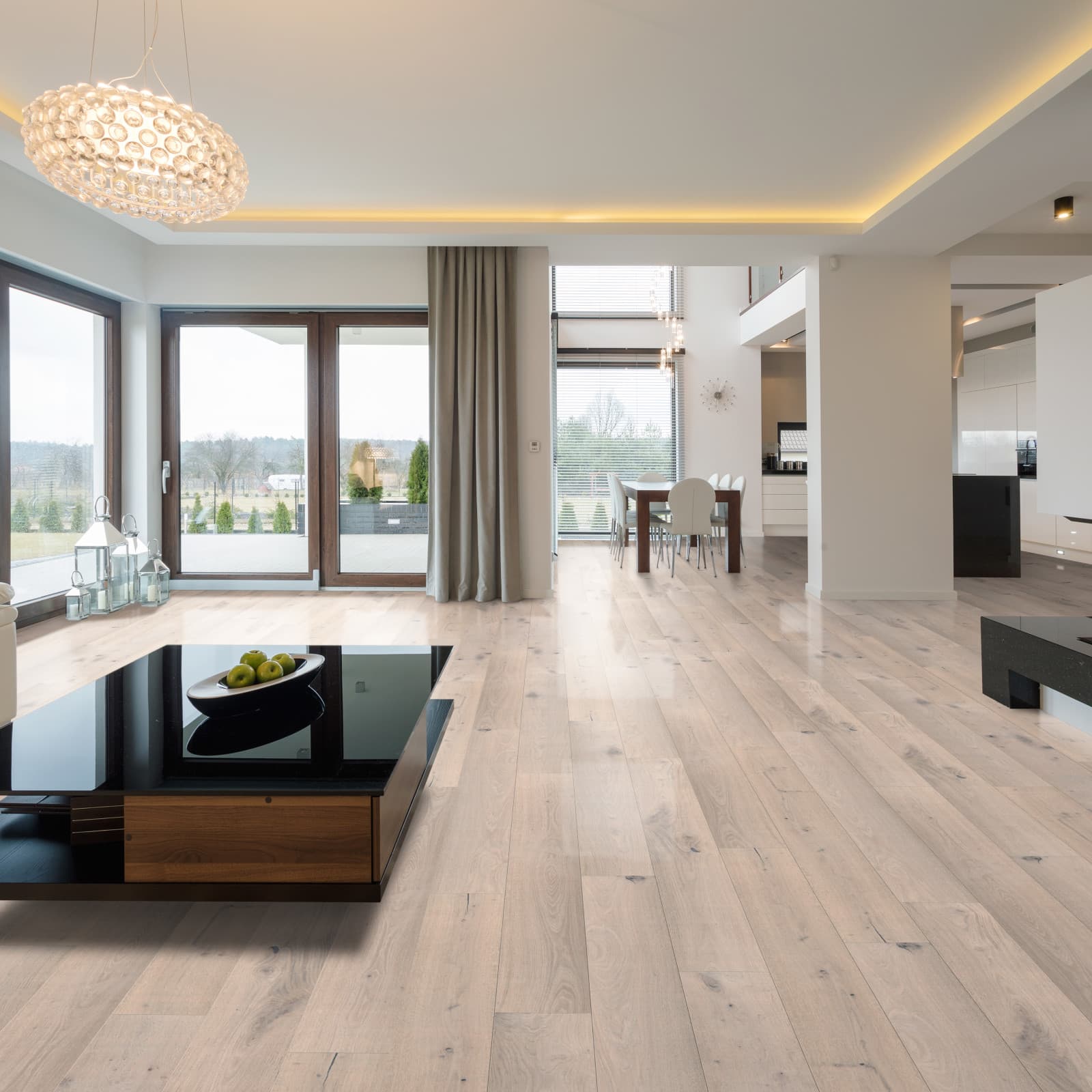 CALI Hardwoods Meritage New World - light European white oak with visible grain in an oversized engineered plank, installed in a transitional modern living room