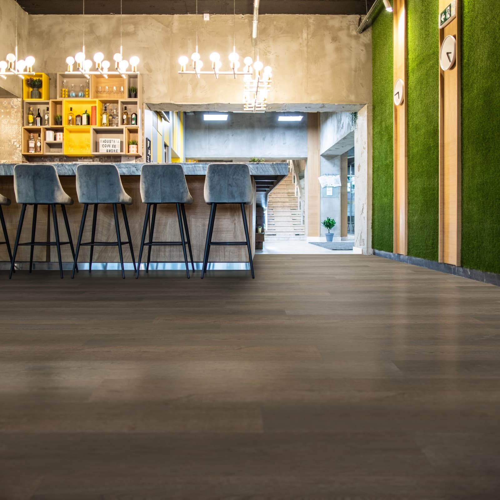 CALI Vinyl Select Thornwood - warm mid-brown waterproof vinyl plank in a warm-traditional family living room