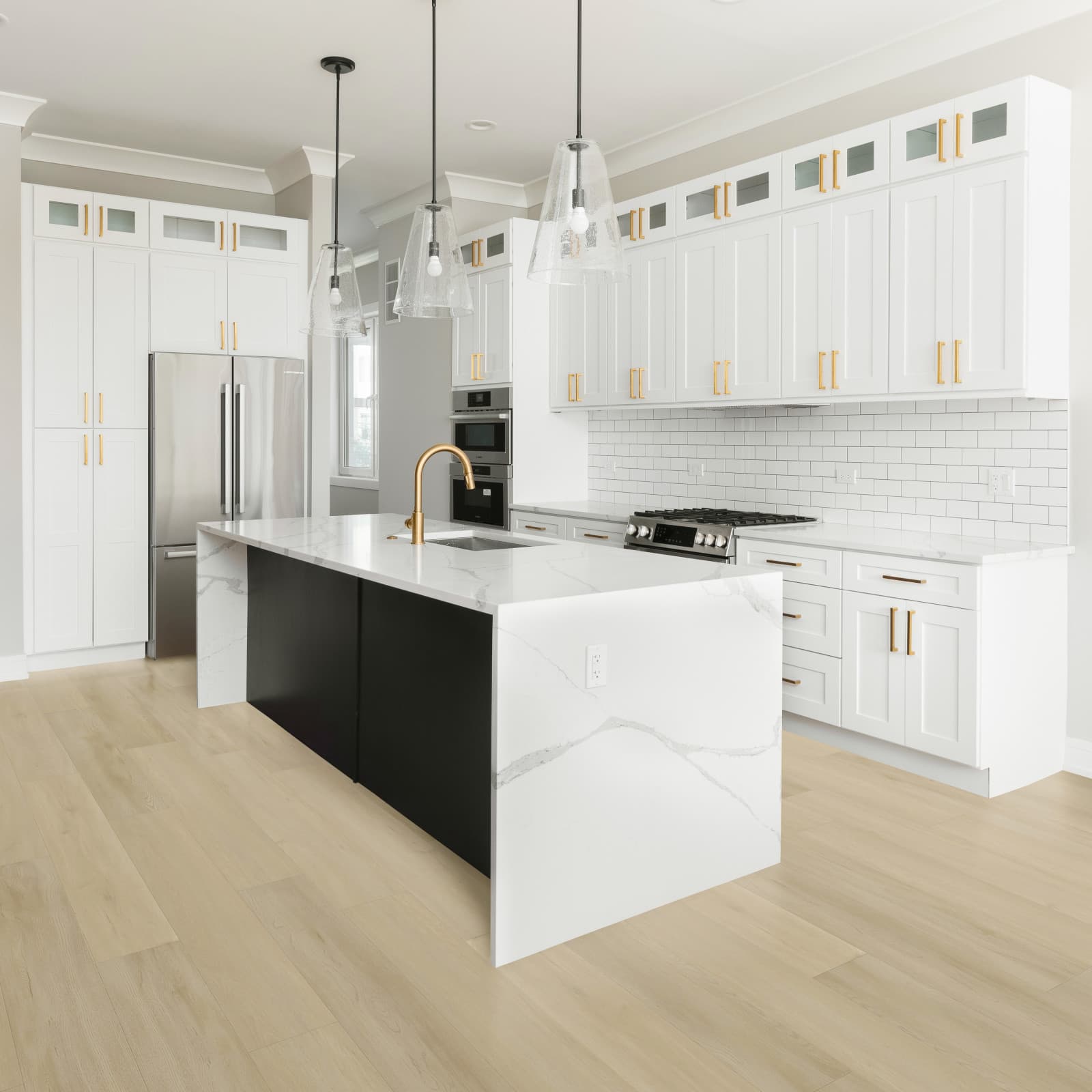 CALI Vinyl Select Premium Dawn Patrol - soft natural tan waterproof plank in a transitional kitchen