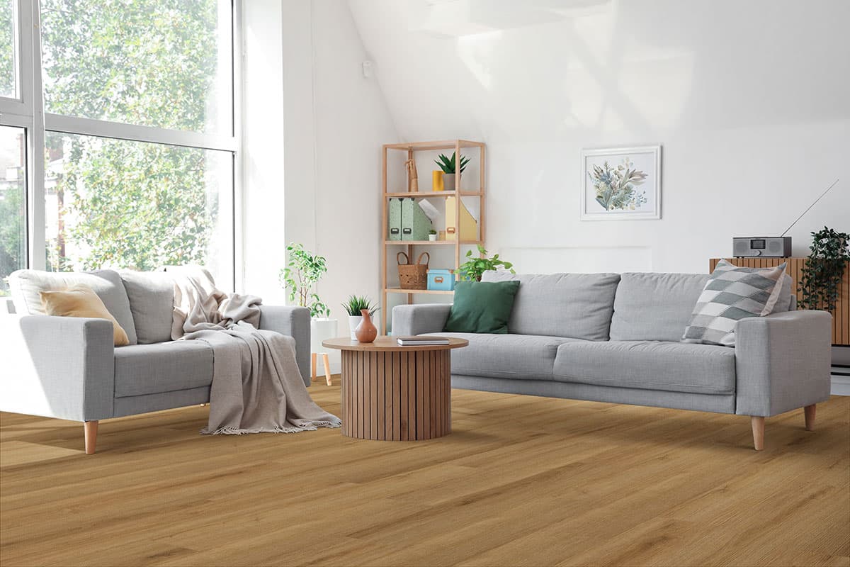MSI Cyrus Amber Forrester - warm honey amber vinyl plank in a Craftsman-leaning living room