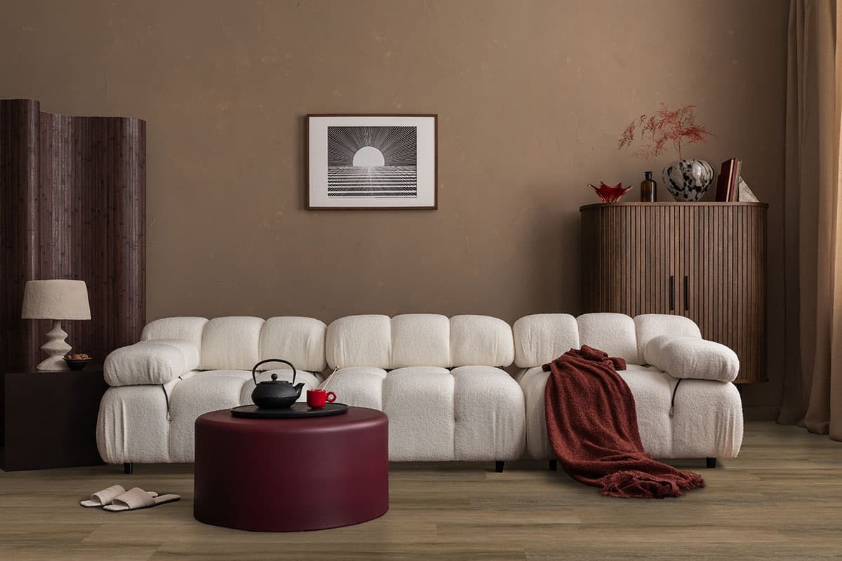 MSI Laurel Reserve Hatboro Hills - warm mid-brown vinyl plank in a layered modern living room